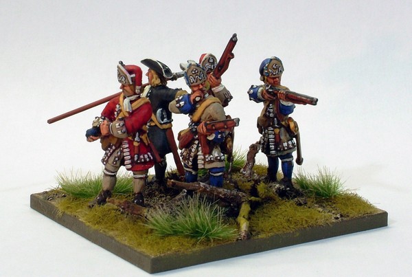 B018 converged grenadiers firing in mixed caps